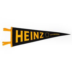 a black and yellow pennant with the name heinez in german written on it