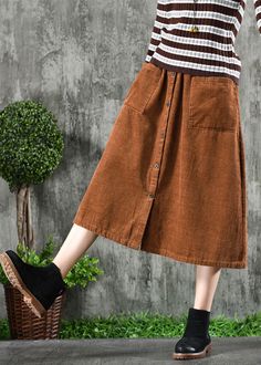 Stylish Khaki High Waist Big Pockets Corduroy A Line Skirt Winter Relaxed Skirt With Pockets For Fall, High Waist Skirt With Pockets For Fall, Corduroy Skirt For Winter, Casual Corduroy Skirt With Pockets, High-waisted Brown Corduroy Skirt, Winter High-waist Cotton Skirt, Casual Brown Corduroy Skirt, Fall Cotton Skirt With Buttons, High-waist Corduroy Skirt For Fall