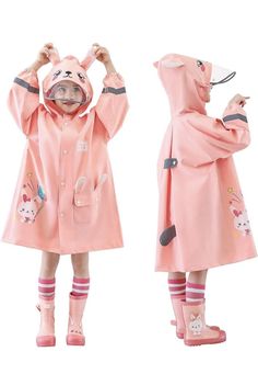 Keep your little one dry and stylish with this adorable INTE KIDS raincoat jacket. This unisex raincoat features a cute 3D cartoon bunny rabbit character that your child will surely love. The jacket comes in a beautiful pink color and is made of durable blended fabric with a polyester insulation material, perfect for any season and occasion. The raincoat has a regular fit with long sleeves, zip snap closure, and a hood, hood has removable visors for extra for added protection against the rain. I Long Sleeve Windbreaker For Rainy Weather, Pink Waterproof Raincoat For Fall, Oversized Waterproof Long Sleeve Raincoat, Oversized Long Sleeve Waterproof Raincoat, Oversized Pink Hooded Jacket With Long Sleeves, Oversized Pink Long Sleeve Hooded Jacket, Casual Long Sleeve Cape For Spring, Casual Long Sleeve Spring Cape, Pink Waterproof Hooded Outerwear