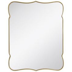 a gold framed mirror on a white background