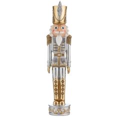 a gold and silver nutcracker with a crown on it's head, standing upright