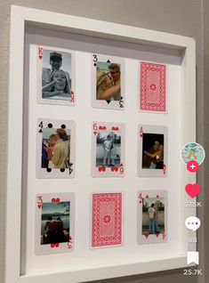 a white frame with playing cards in it