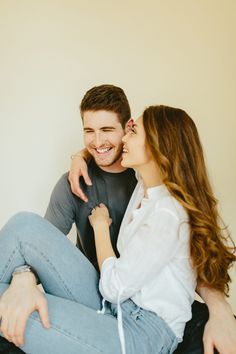 a man and woman sitting next to each other