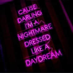 a neon sign that says cause daring i'm a nightmares dressed like a daydream