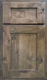 a close up of a wooden cabinet door on a white background with wood grains