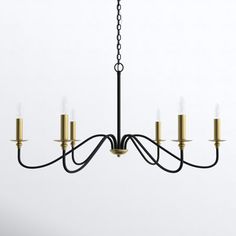 a black chandelier with five candles hanging from it's center and four arms