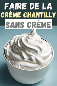 a white bowl filled with whipped cream on top of a blue tablecloth and the words faire de la creme chantill