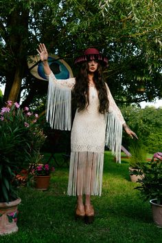 The perfect 1970s style fringe dress! It features cream lace fabric with long silky fringe around the bottom & sleeves. This is a beautiful gem from my personal collection  ⫸ no notable flaws ⫸ TRUE ART TO WEAR! ⫸ Fabric: lace: cotton/nylon. The lining feels like polyester? ⫸ Hand wash only ⫸ Ready to ship ✌ From Poland with love ˗ˏˋ ♡ ˎˊ˗ *Worldwide shipping via DHL EXPRESS (1-5 days) ❁ ❀ 🌸 ✾ ✿ ❋ ❁ ❀ 🌸 ✾ ✿ ❋ ❁ ❀ 🌸 ✾ ✿ ❋ ✂ Would best suit a size MEDIUM??  but please check out all measurements Fringe Dress Long Sleeve, Summer Lace Dresses With Fringe, Spring Beige Fringe Dress, Vintage Summer Dress With Beaded Fringe, Vintage Beaded Fringe Summer Dress, Spring Hippie Fringe Dresses, Spring Bohemian Dress With Beaded Fringe, Vintage Fringe Dress, Style Summer Dress