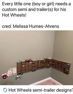 a child's room with toy cars and trucks on the wall next to it