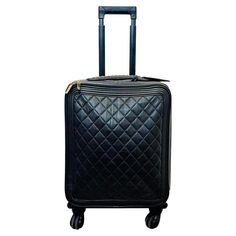 Chanel Caviar Quilted Leather Coco Suitcase Black trolley bag designed with signature diamond stitching, four wheels and extendable handle. Detailed with gold hardware, chain embellished top handle with leather 'CC' logo embossed tag. Styled with quilted slip pocket to the side and zip fastening. Featuring spacious fabric interior with zipped pocket and four 'Chanel' engraved 'CC' logo wheels. Gold 'CC' logo to elasticated interior straps, lots of logo through out From 2016 - 2017 Collection. Si Designer Travel Bag, Chanel Luggage, Designer Travel Bags, Trolley Bags, Chanel Logo, Bag Suitcase, Chanel Caviar, Embellished Top, Carry On Luggage