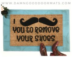 a door mat that says, i mustache you to remove your shoes