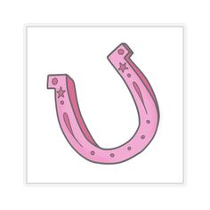 the letter u is pink and has stars on it, as well as a horseshoe