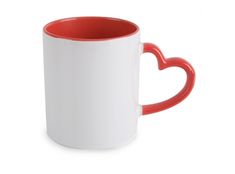 a red and white coffee mug with a heart shaped handle on the inside of it