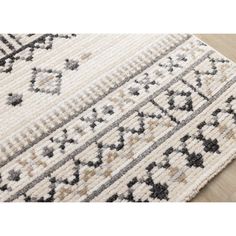 Experience the allure of boho artistry with our cream gray black beige southwestern pattern area rug. Meticulously crafted in Turkey from premium Heatset Polypropylene, its unique ribbed texture, and captivating color scheme infuse your space with warmth and style. This rug features an intriguing pattern illustrated by geometric shapes, intricate lines, and bold stripes. Transform your space with the rug today! Union Rustic Rug Size: Rectangle 5'3" x 7'7" | Black;cream Rectangle 5'3" x 7'7" Area Blue Striped Rug, Southwest Area Rugs, Kas Rugs, Throw Pillow Fabric, Natural Mattress, Southwestern Patterns, Mattress Box Springs, Pattern Rug, Bold Stripes