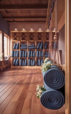 An elegant yoga studio with inviting, organized mat storage. Storage Idea, Yoga Room, Loving Your Body