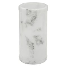 a white marble vase sitting on top of a table