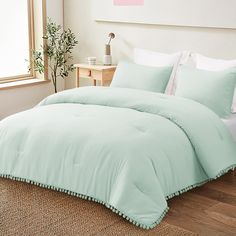 the comforter is mint green in color