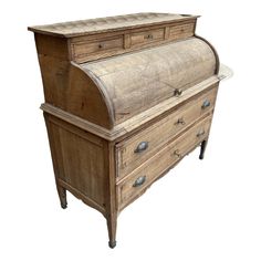 an old fashioned wooden desk with drawers