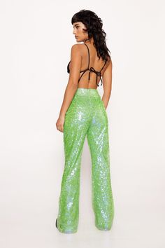 Add some glam. Feel like the centre of attention in our flare pants, made in high quality sequin fabric, with a flattering flared silhouette and high waistline. Style the with a crop top or bralette for a stellar occasion look, perfect for anything from party nights to festival weekends and concerts. Premium Sequin Flare Pants High Quality Sequin Fabric Flattering Flared Silhouette Stellar High Waistline Statement, Sparkling Sequins Model wears a size M (US size 6/UK size 10).Shine on. Rock your PM plans with an array of timeless sequin outfits. Shop mini and maxi sequin dresses to the perfect sequin tops to pair with jeans. Ensure your outfit is one to remember. Sequin Outfits, Sequin Flare Pants, Going Out Trousers, Sequin Dresses, Sequin Outfit, Oasis Fashion, Sequin Fabric, Sequin Top, Fashion Face