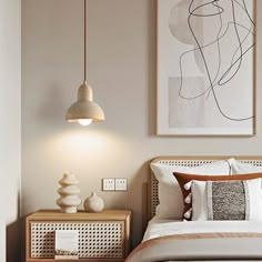 a bed sitting under a painting next to a lamp on top of a wooden table