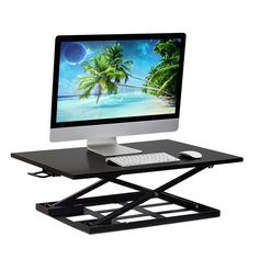 a computer desk with a keyboard, mouse and monitor sitting on it's stand