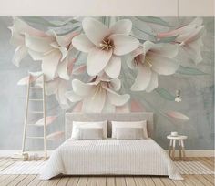 a bedroom with a large flower mural on the wall