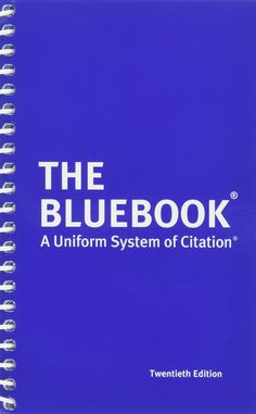 a blue book with white writing on it