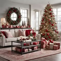 a living room decorated for christmas with presents