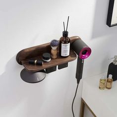 Introducing the Afralia™ Hair Dryer Holder: Wall Mount Beech Wood Rack, a premium addition to your bathroom. Crafted from high-quality solid wood, this single tier holder offers a stylish and practical solution for storing your Dyson Supersonic Hair Dryer. Designed with a bolt-inserting type installation style, the Afralia™ Hair Dryer Holder is easy to set up and securely mount in the corner of your bathroom, keeping your space organized and clutter-free. The elegant gold finish adds a touch of Hair Straightener Holder, Type Installation, Supersonic Hair Dryer, Dyson Hair Dryer, Dyson Supersonic, Hair Dryer Holder, Wood Rack, Bathroom Shelf, Space Organizer