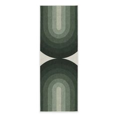 two green and white rugs with circular shapes on the bottom, one in grey