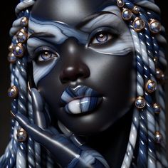 a close up of a woman with blue makeup and braids on her face,