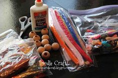 an assortment of craft supplies on a table