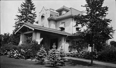 an old black and white photo of a house