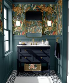 a bathroom with green walls and blue cabinets