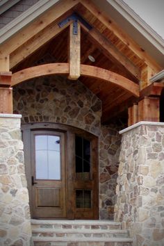 Outside House Stone Ideas, Wood Trusses Exterior, Stone Wall Exterior House, Stone Door Frame, Buechel Stone, Stone Installation, Veneer Pattern, Entry Ideas, Stone Exterior