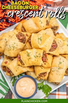 cheeseburger crescent rolls on a white plate with dipping sauce in the middle and text overlay that reads cheesburger crescent rolls