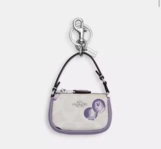 Style Number CR498 Measurements Length: 3.25" Height: 2.0" Width: 1.0" Materials Printed coated canvas and recycled leather Strap Handle with 2.25" drop Features Zip closure Attached split key ring and dogleash clip Mini Bag Keychain, Blueberry Print, Coach Mini Bag, Light Violet, Bag Keychain, Recycled Leather, Key Ring, Key Rings, Mini Bag