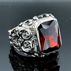 Men Handmade Garnet Stone Ring, Silver Red Stone Garnet Ruby Ring, Hand-Engraved Vintage Men Ring Ottoman Style Ring, 925k Sterling Silver ★Item Details * Gender : Male / Female * Material : 925K Sterling Silver * Total weight : 19 Grams * Gemstone : Garnet Ruby Stone ✔ Ready to Ship in 1-2 Business Days .. ✔ Shipped to the Worldwide 1-5 business days with free shipping... ✔ The product will be sent to you with a handmade wooden box to avoid any damage during shipping... ✔ Visit our store, browse other Men's jewelry, silver and gold collections, and find the perfect piece you're looking for... Click For Our Other Products https://www.etsy.com/shop/MercansilverTR?ref=simple-shop-header-name&listing_id=1003010735 Garnet Stone Ring, Emerald Stone Rings, Mystic Topaz Ring, Ottoman Styling, Malachite Rings, Engraved Ring, Engraved Wedding, Lapis Lazuli Ring, Men Ring