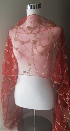 Red colour net shawl with gold floral pattern made with gold thread embroidery and sequins. Very elegant.  Gift it or keep it.  Size is approximate 208cm Length 38cm Width Monitor colour is not accurate. Red And Gold Clothes, Bollywood Red Embroidered Fabric With Sheer Dupatta, Red Organza Dupatta With Zari Work, Festive Red Embroidered Fabric For Party, Festive Red Embroidered Party Fabric, Red Shawl With Resham Embroidery, Red Embroidered Fabric With Dupatta For Celebration, Festive Red Embroidered Fabric With Sheer Dupatta, Elegant Red Shawl Dupatta