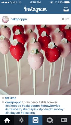 cakepops with flowers on them are sitting on a white tablecloth in front of an instagram page