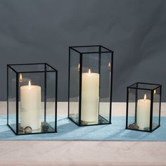 PRICES MAY VARY. Pack & Size: Including 3 pcs glass candle holder, LARGE SIZE: 10.6 x 5.1 x 5.1 inches, MEDIUM SIZE: 9 x 5.9 x 5.9 inches,SMALL SIZE:5.9 x 3.9 x 3.9 inches. Simple & Modern Design: The black candle holder is made of black metal frame and transparent glass. No rust and no fading. Protect Desktop Design: The glass hurricane candle holder adds a layer of velvet bottom to protect your desktop from scratches from glass and metal. Perfect Candle Holder Decoration: The modern candle hol Black Candle Holder, Clear Glass Table, Black Candle Holders, Square Columns, Modern Candle, Electronic Candles, Black Candle, Modern Candle Holders, Desktop Design