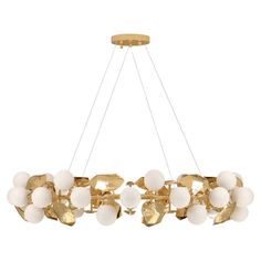 a large chandelier with white and gold balls hanging from it's center