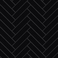 a black and white herringbone pattern is shown in the dark room with no one on it