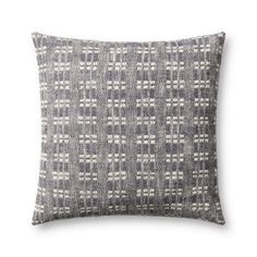 a gray and white pillow on a white background, with small squares in the middle