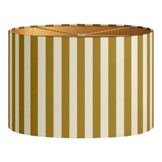 a lamp shade that is yellow and white stripes