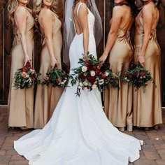 the bride and her bridesmaids are all wearing different dresses