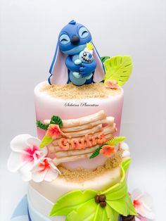 the cake is decorated with an image of stitch and stitch on it's side