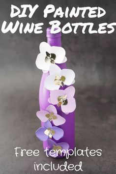 a purple bottle with flowers on it and the words diy painted wine bottles free templates included