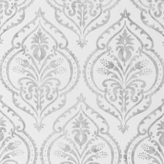 a white and silver wallpaper with an ornate design on it's surface,