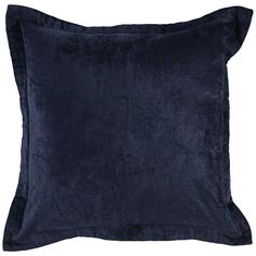 a dark blue velvet pillow on a white background